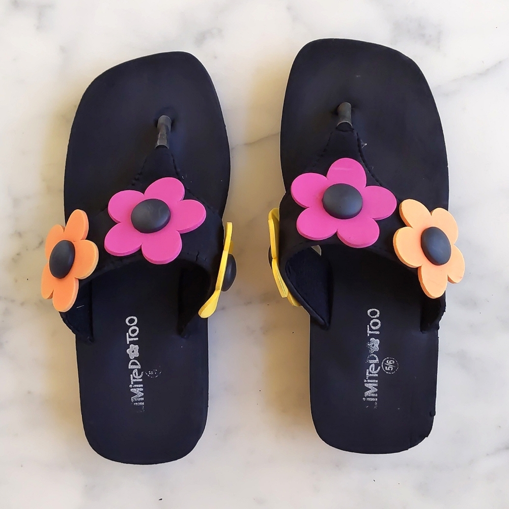 Limited Too Flip flops/Sandals with multi color flowers and 1 1/4" thick bottom.
